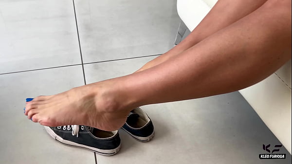 Kleo Furiosa gives a nice foot job and rimjob after a day at work to get anal and facial